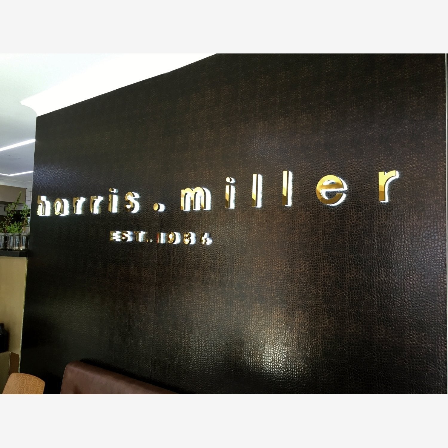 Harris Miller textured vinyl with acrylic and mirror gold acrylic lettering - Signarama Sydney CBD South