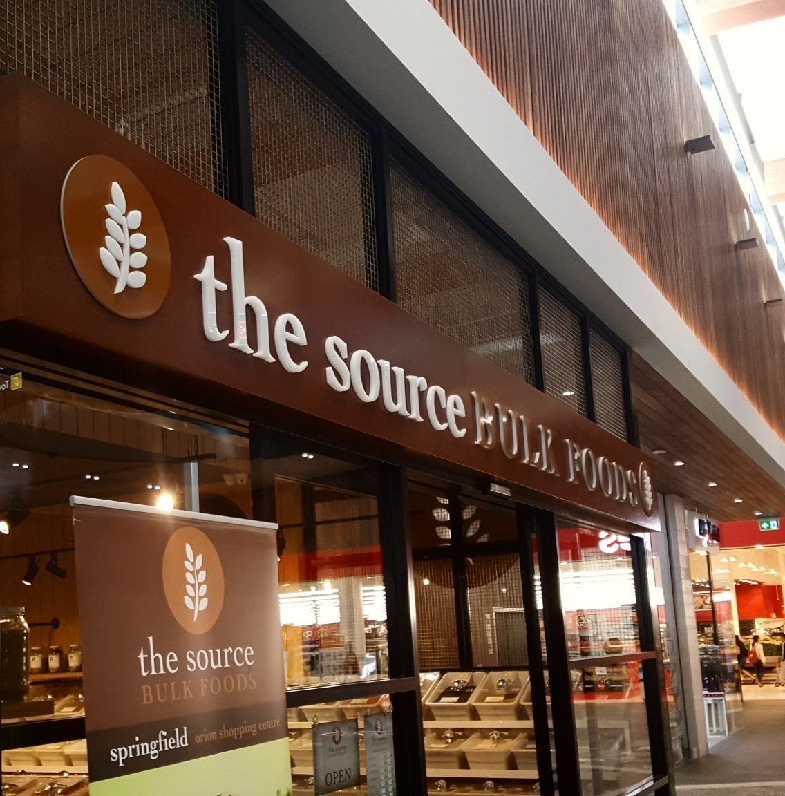The Source Bulk Foods lightbox with vinyl and acrylic 3d letters - Signarama Sydney CBD South