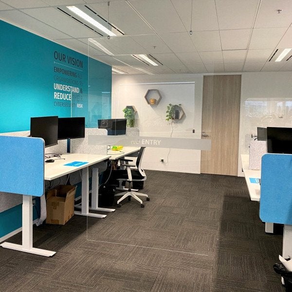 Custom Acrylic desk dividers and acrylic suspended room dividers entire floor - Signarama Sydney CBD South