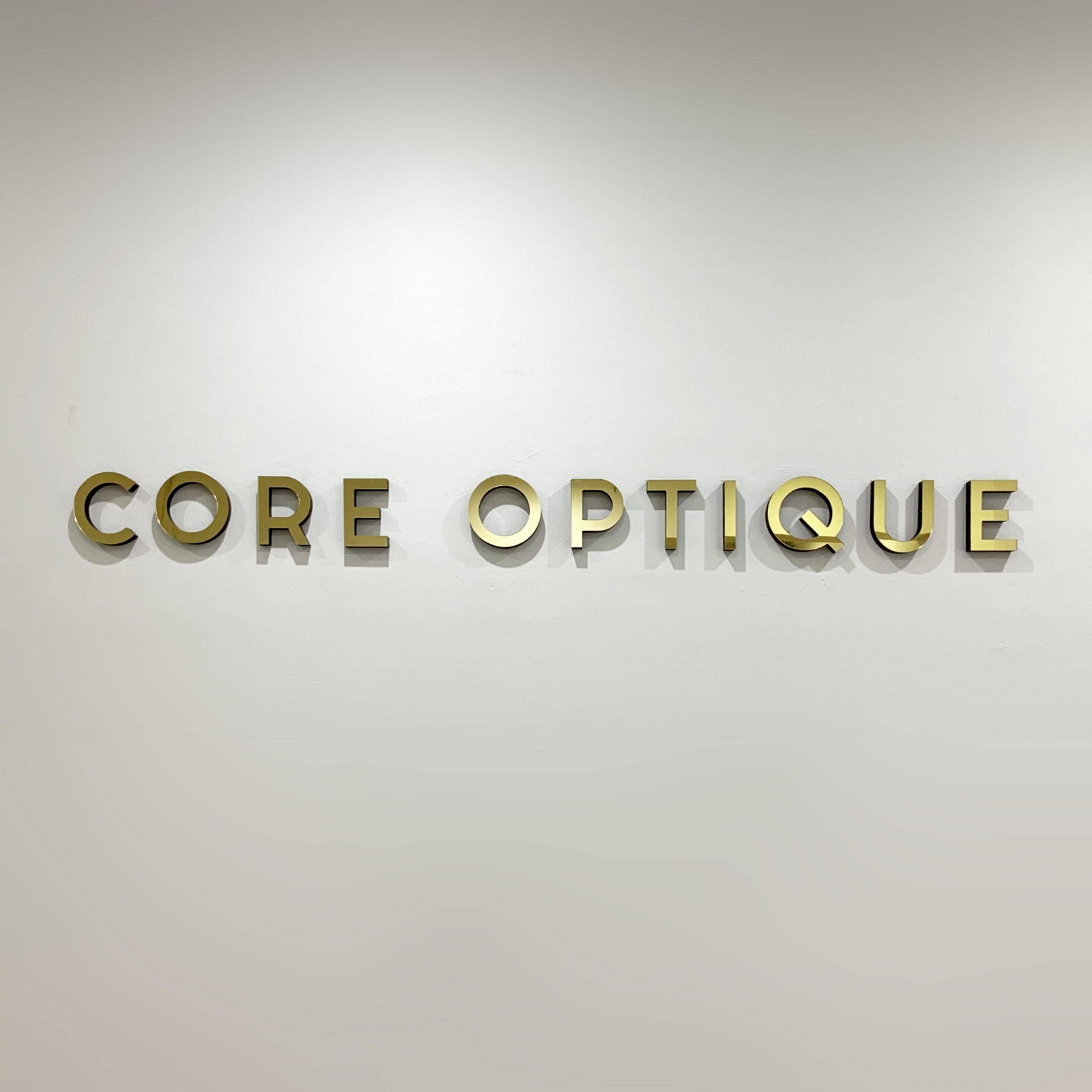 Core Optique - Custom Acrylic gold lettering - Signarama Sydney CBD South