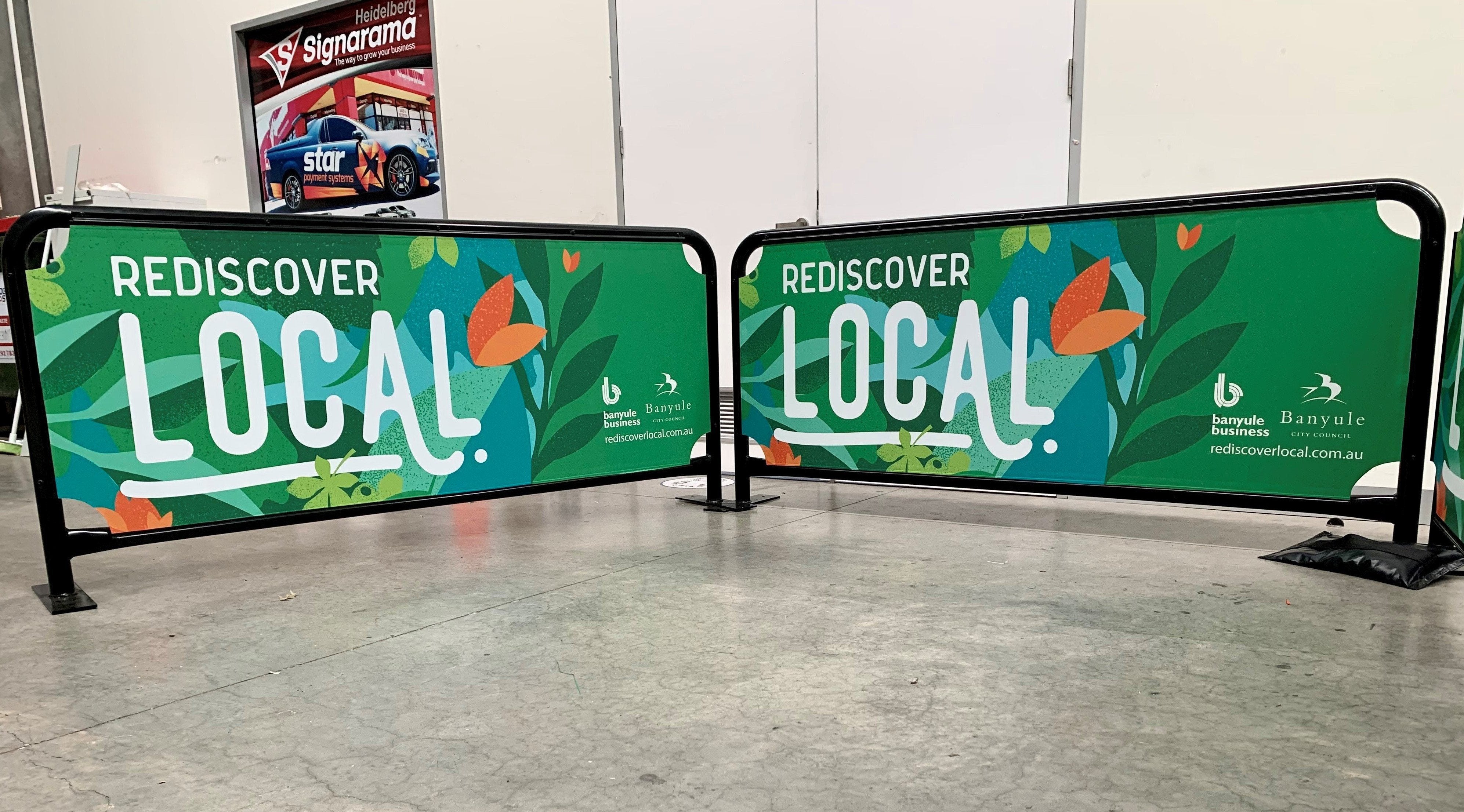 A natural green graphic for a rediscover local campaign on cafe barriers | Signage