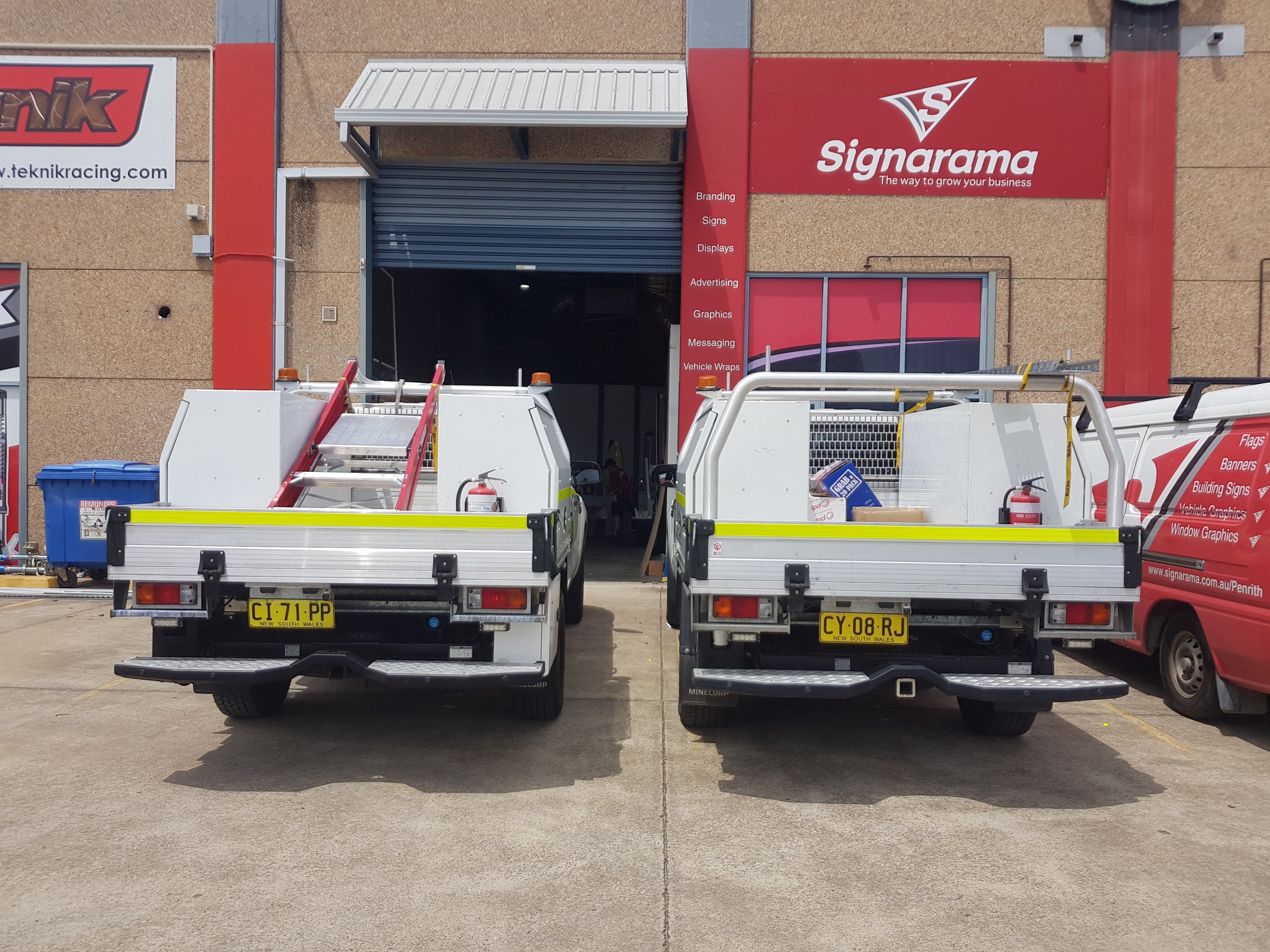Reflective Vehicle Signage for fleet vehicles. Required reflective graphics, numbers and strips/tape
