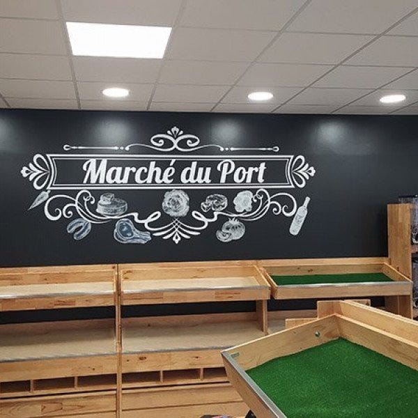 Lettres adhésives blanches sur mur noir - sticker mural géant