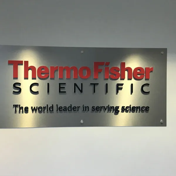 Thermo Fisher Scientific acrylic wall sign with company slogan