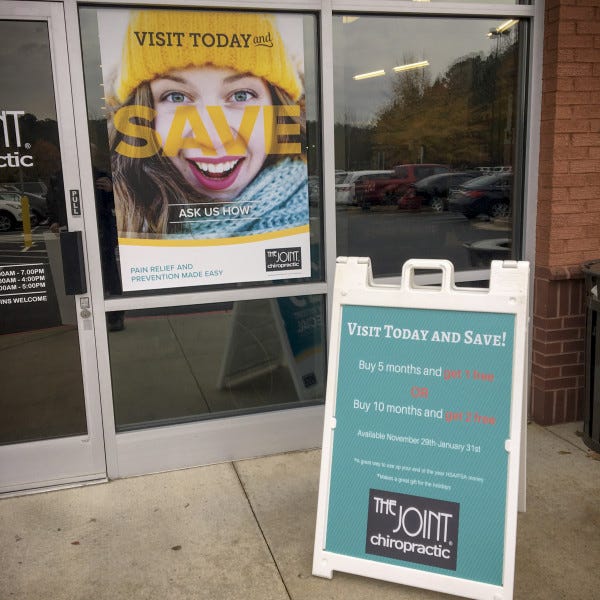 Sidewalk Sign and Window Perf