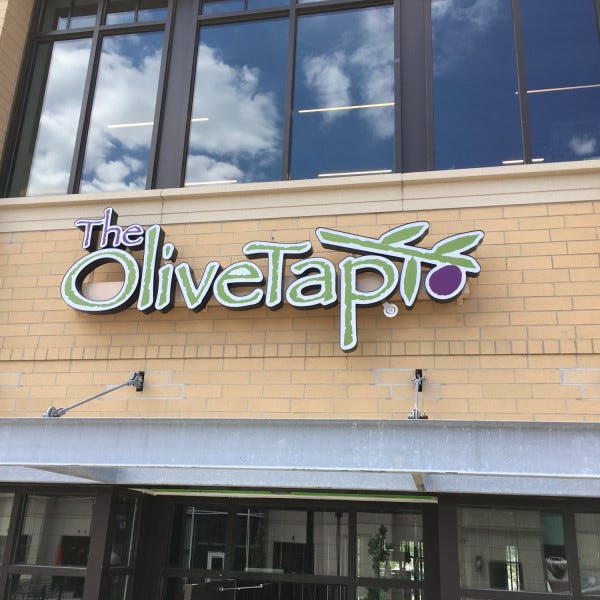 The Olive Tap sign
