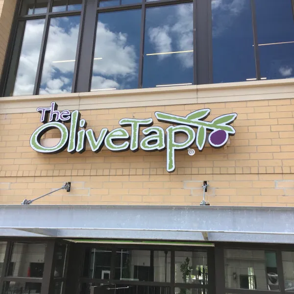 The Olive Tap sign