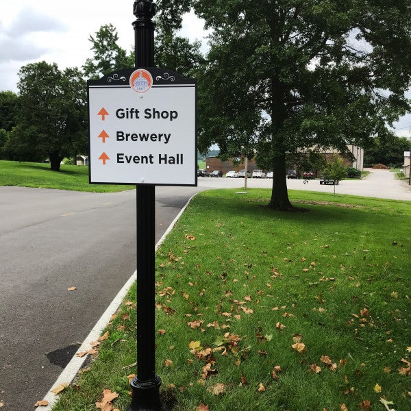 Sisters of St Benedict Outdoor wayfinding sign on a decorative post