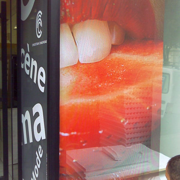 Impression numerique sur vinyl microperfore Signarama Issy les Moulineaux- ISSY LES MOULINEAUX