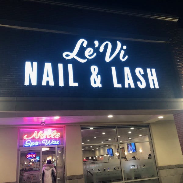 Levi Nails Illuminated Sign