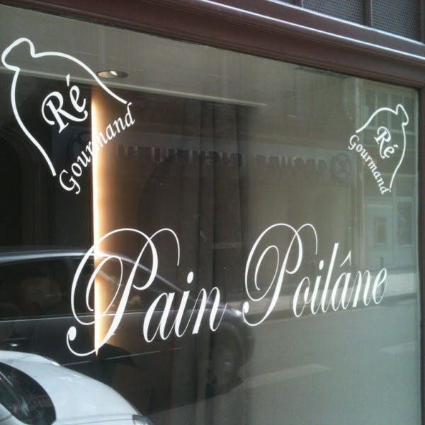 Lettrage découpé posé sur vitrine- PARIS 01