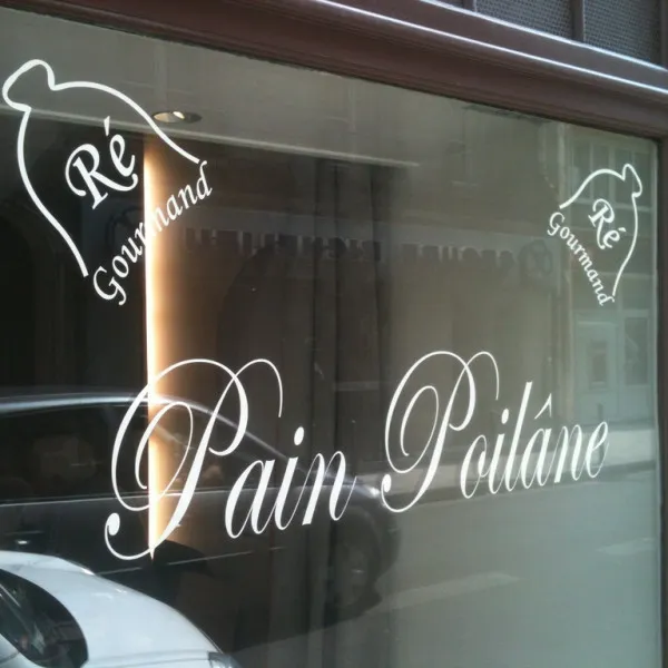 Lettrage découpé posé sur vitrine- PARIS 01