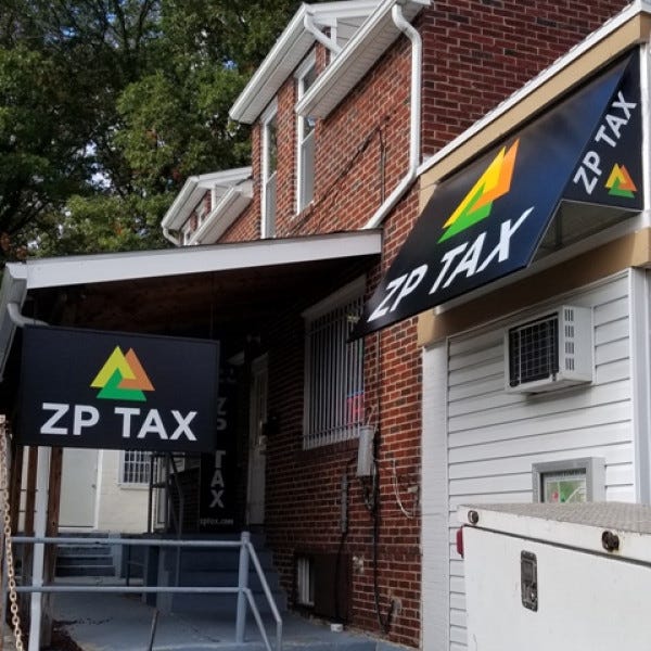 Awning With Digital Graphics Hanging Signsignarama Silver Springzp Tax Takoma Park Md