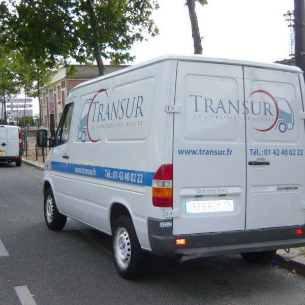Lettrages sur une flotte de véhicules utilitaires ; création, réalisation et pose- PARIS 12