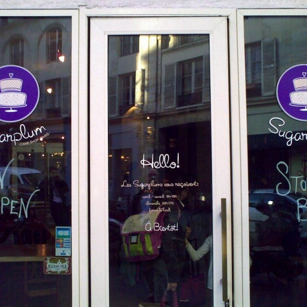 Impression numérique + letttrages sur vitrine et porte ; création, réalisation et pose- PARIS 05