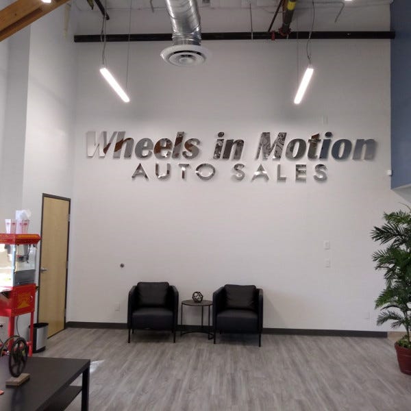 Wall Sign-Wheels In Motion