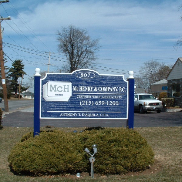 Carved Sign - McHenry Accounting