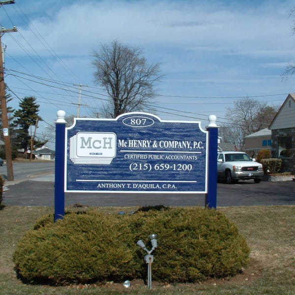 Carved Sign - McHenry Accounting