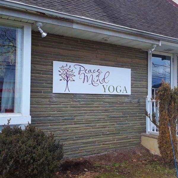 Carved Sign For Peace Of Mind Yoga