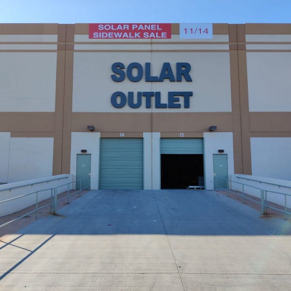 Building Sign-Solar Outlet