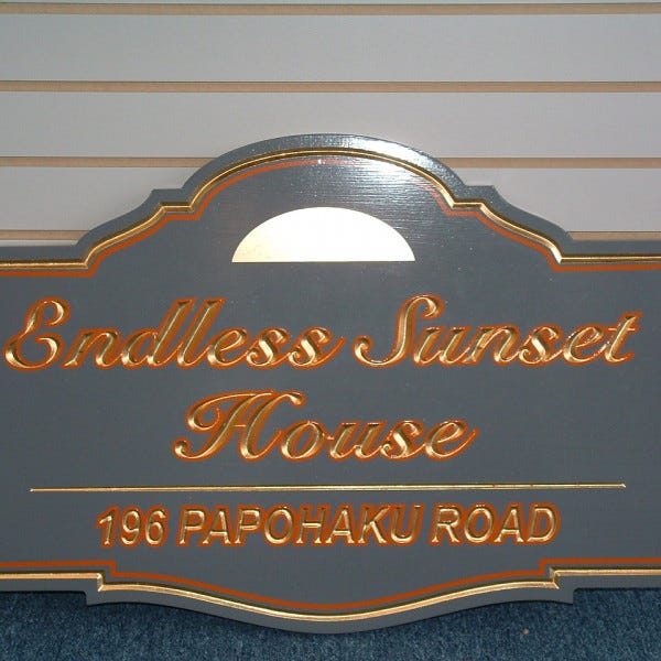 Carved Sign - Endless Sunset House