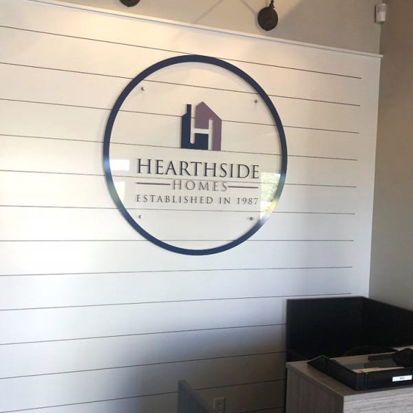 Tempered glass sign with vinyl graphics