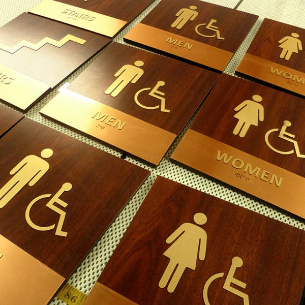 Dark Mahogony Backgrround With Copper Text Panels   Ada Signs For Medical Complex   South Burlington Vt