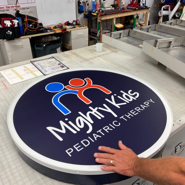 Mighty Kids Cabinet On The Table Signarama Liberty Signs Near Me