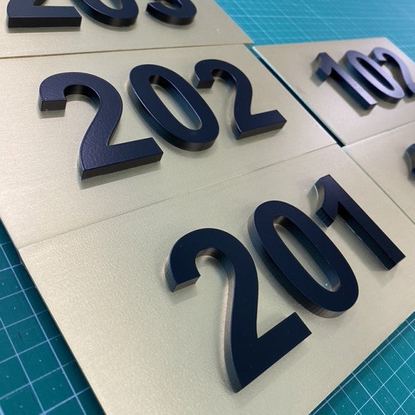 Room Numbers (Door lettering) Brass plate with spray painted
