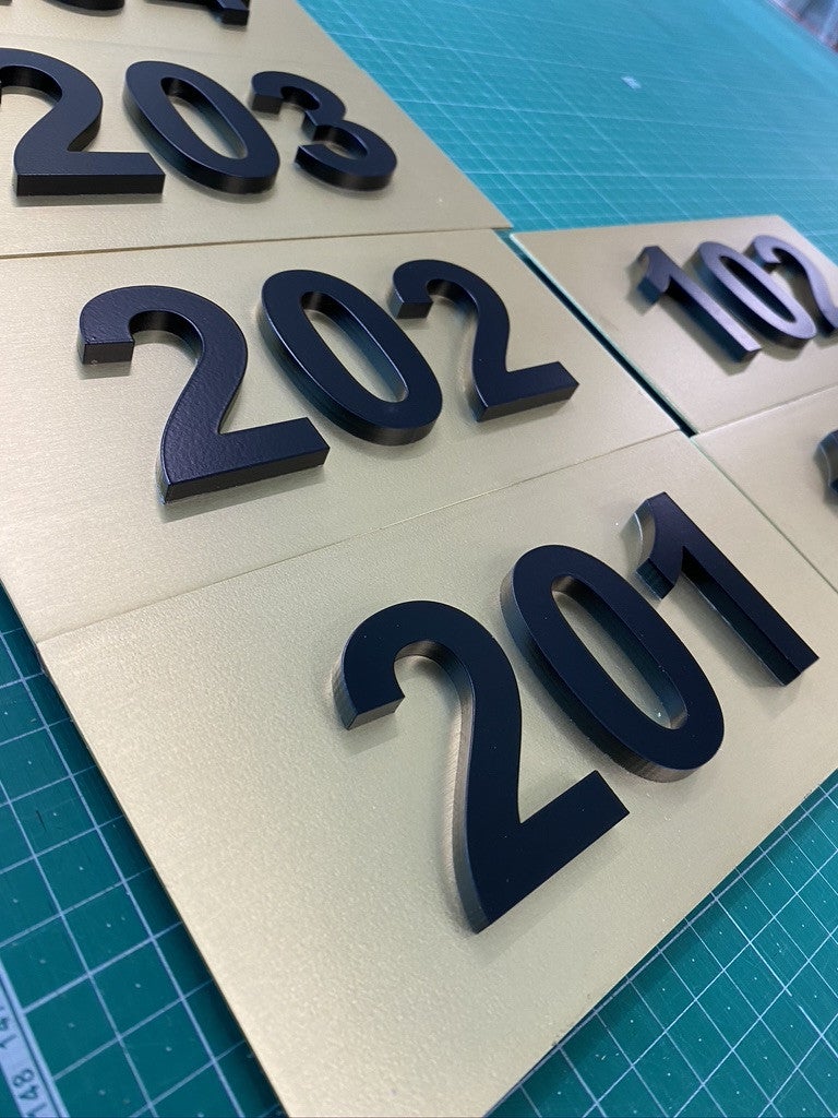 Room Numbers (Door lettering) Brass plate with spray painted