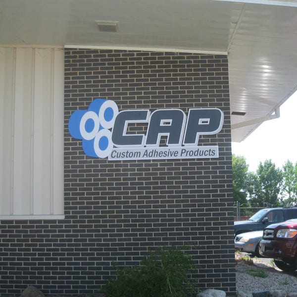 Custom Adhesive Products Routed Building Sign