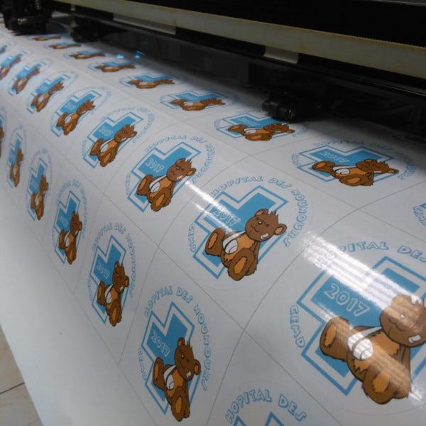 STICKERS - étiquettes adhésives imprimées et découpées à la forme.- DIJON