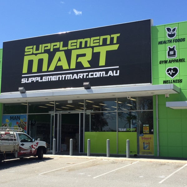 Shop front using a combination of materials including a grand format banner, router cut ACM with vinyl graphics, one way vision and digitally printed window graphics.