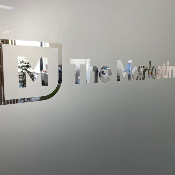 The Marketing Co Frost with reverse cut logo, door graphics - Signarama Sydney CBD South