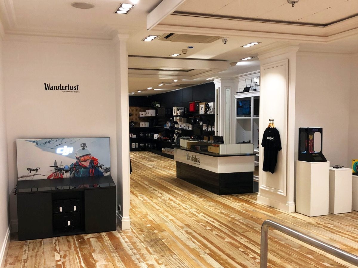 Wanderlust Camera Electronic Store Signage