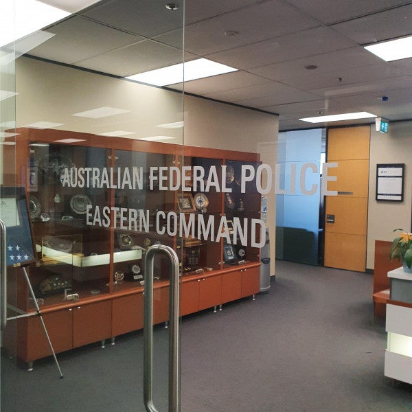 Australian Federal Police_Frosted Vinyl lettering - Signarama Sydney CBD South
