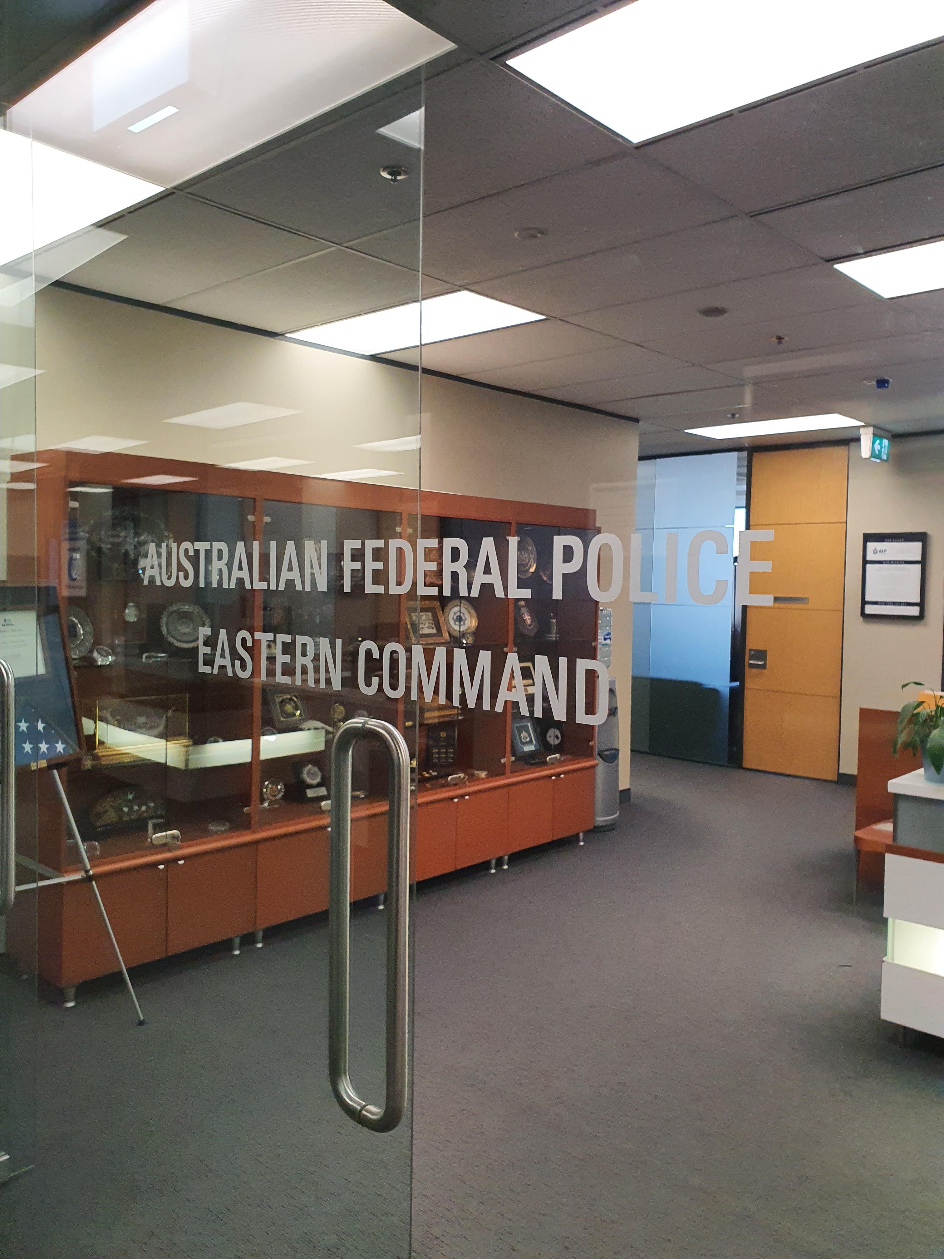 Australian Federal Police_Frosted Vinyl lettering - Signarama Sydney CBD South