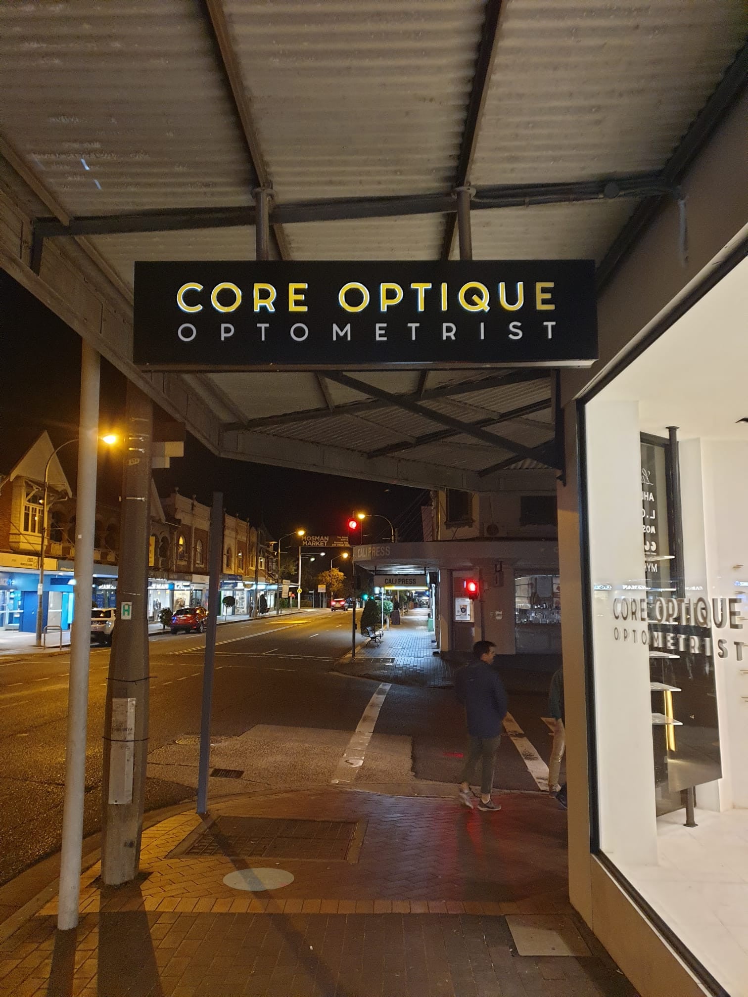 Core Optique Mosman_custom opal acrylic suspension shelf system