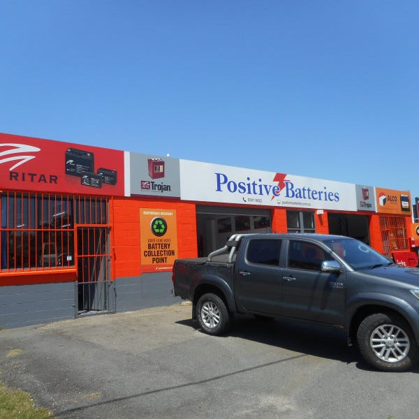 Building Signage Positive Batteries