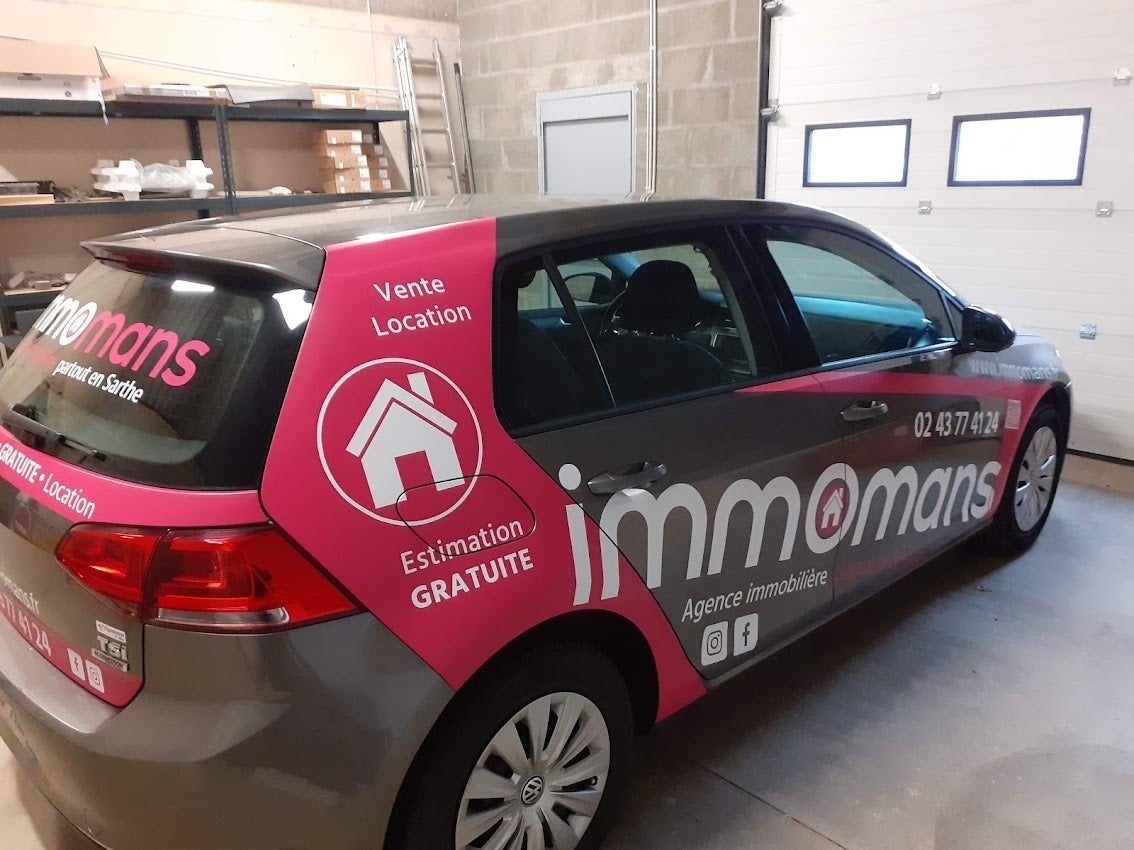 Habillage d'un véhicule pour Immomans installé sur Le Mans par Signarama Le Mans