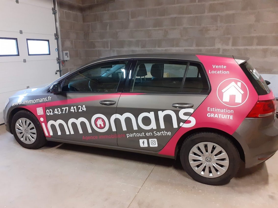 Habillage d'un véhicule pour Immomans installé sur Le Mans par Signarama Le Mans