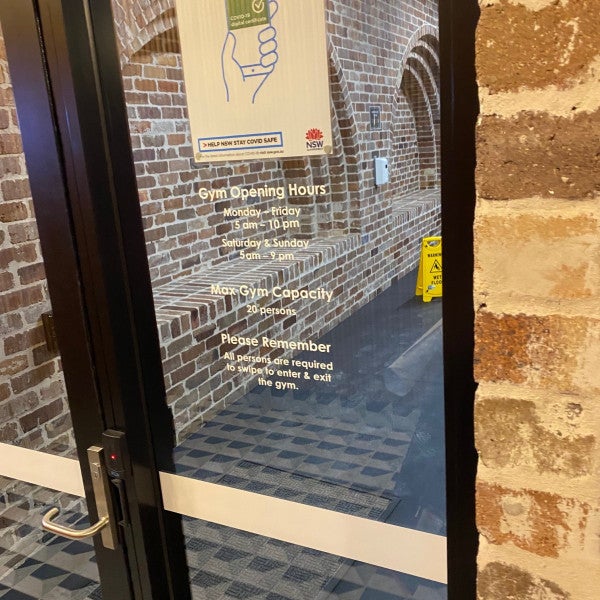 Lateral Estate Vinyl lettering onto glass