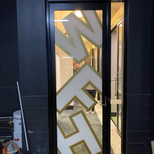 Lateral Estate Vinyl lettering onto glass2