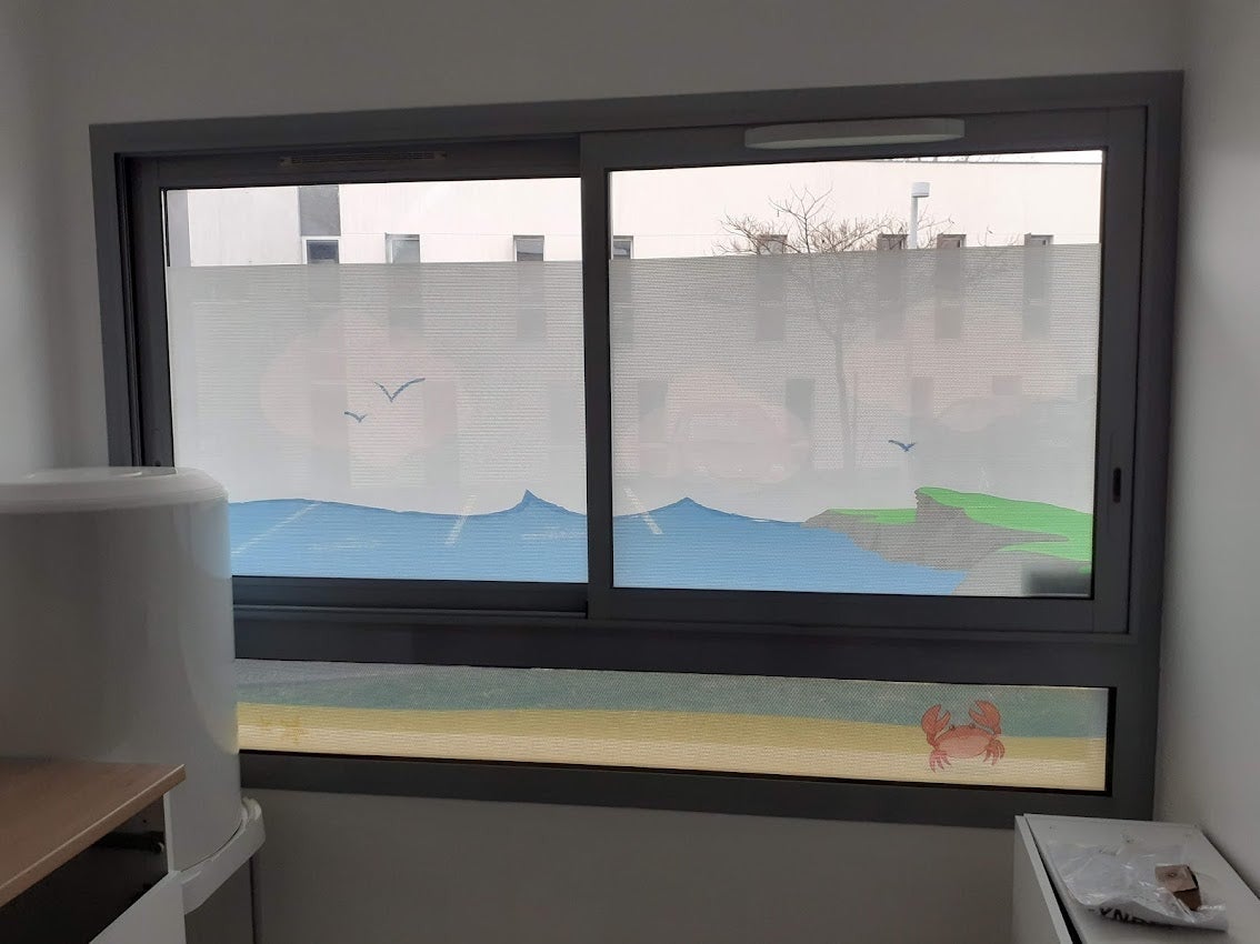 Habillage de vitres pour une nouvelle Micro Crèche Marins d'eau douce installée sur Tours Nord par Signarama Le Mans
