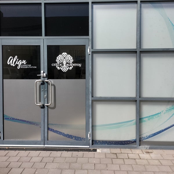 Silver frosted windows with computer cut graphics over the top.