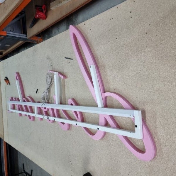 Behind the scenes of Désordre's illuminated sign