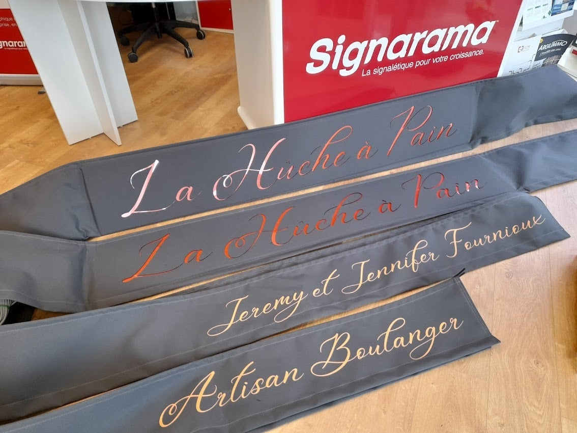 Nouvelle Enseigne pour la Boulangerie La Huche à Pain installé à Sablé Sur Sarthe par Signarama Le Mans