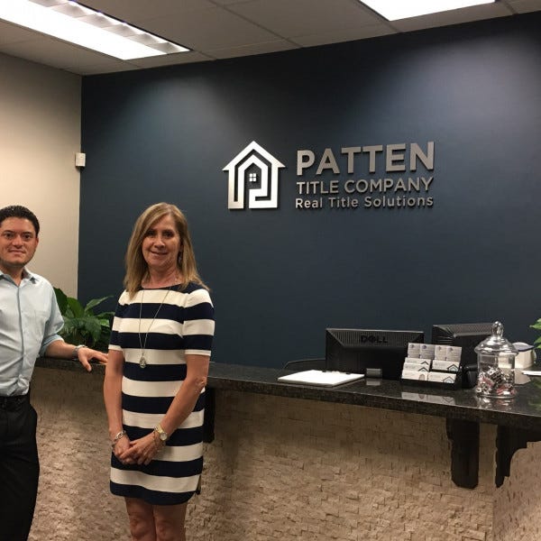 Brushed Metal Lobby Sign At Patten - Cypress, TX