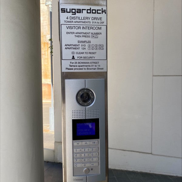Custom paint fill and engraved intercom signage