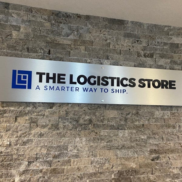 brushed aluminum indoor sign on standoffs